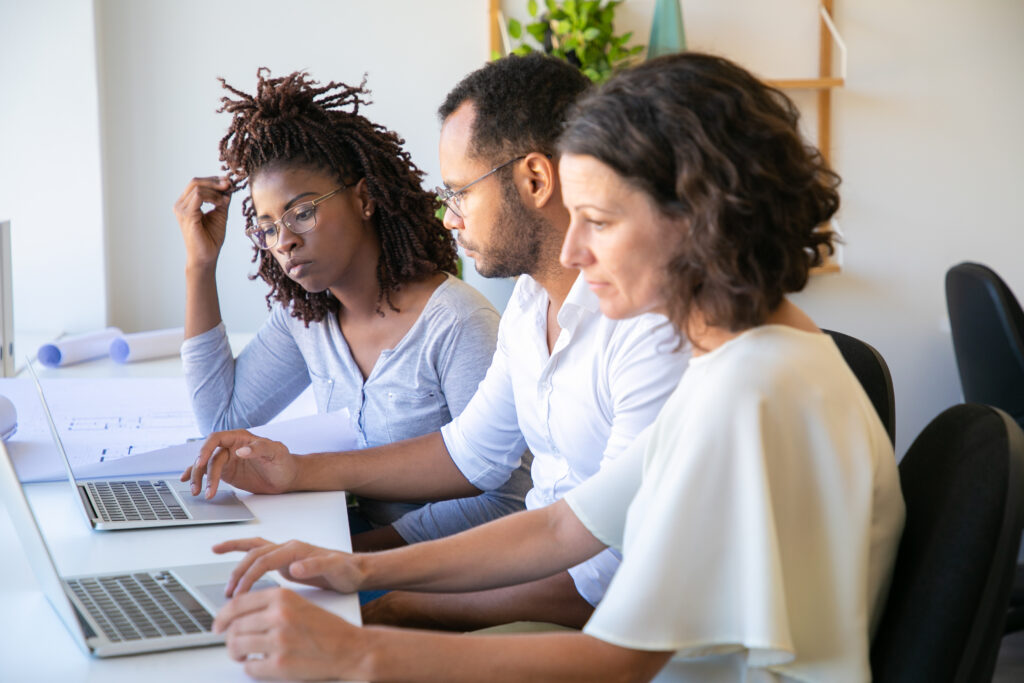 confident architects discussing new project